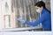 Disinfection of premises. A medical medical doctor disinfects and ventilates the coronavirus global warning and pandemic in the