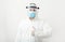 Disinfector or Doctor wearing protection suit and face mask showing thumbs up,positive gesture. Like to the end of pandemic
