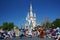 Disney cartoon characters marching parade in Magic Kingdom park