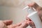 Dispensing liquid soap in the male hand