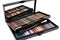 display of eye shadow palettes and brushes in sleek black case