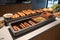display of hot dogs and sausages in modern, sleek setting