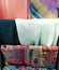 Display mixed fabric coloured scarfs