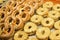 Display of traditional doughnuts on sale at Christmas market stall in Austria