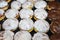 Display of traditional doughnuts on sale at Christmas market stall in Austria