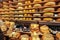 Display of traditional Dutch cheese, like Edam and Gouda cheese at local cheese shop, Alkmaar,