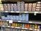 A display of various cans of tuna and salmon in the canned foods department of a Whole Foods Market Grocery Store