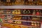 Display window of a bakery and pastry shop of with variety of baked goods, breads, donuts, puff pastry, closeup. Philippines.