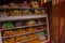 Display window of a bakery and pastry shop of with variety of baked goods, breads, donuts, puff pastry, closeup. Philippines.