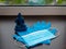 Disposable blue medical gloves, mask and health symbol blue medicine buddha