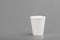 Disposable empty white paper cup copyspace