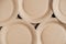 Disposable kraft paper plates as background image. Eco friendly disposable tableware. Top view. Copy, empty space for text