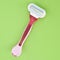 Disposable Safety Razor on a Vibrant Background