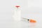 Disposable syringe and insulin vial