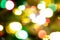 Disposessory abstract Christmas multicolored background. Abstract bokeh of different colors on a black background