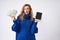 Dissatisfied curly blonde woman with tablet and money in hand