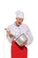 Dissatisfied woman chef with blender and pot
