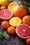 Dissected fresh fruits. Orange, grapefruit and tangerines