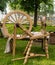 Distaff wheel wooden device - image background homemade cloth production