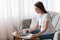 Distance Learning. Young Pregnant Woman In Headset Study With Laptop At Home