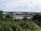 in the distance a very high bridge overlooking the landscape