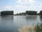 Distant beach on a lake