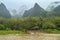 Distant boats and hills near Yangshuo