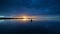 Distant kayaker at sunset on Coot Bay in Everglades National Park, Florida.