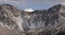 Distant mountain range with a light dusting of snow.