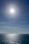 Distant paraglider over the north Cornwall coastline