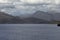 Distant snowcapped mountains in Dusky Sound