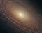 Distant spiral galaxy with dust lanes