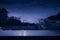 A distant thunderstorm over the sea