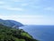 A distant view of the Cabot Trail on Cape Breton Island, Nova Scotia, Canada. The beautiful coastal highway provides amazing view