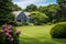 distant view of a cape cod brick house nestled in greenery