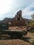 Distant view of huge multi-story wooden barn in desert