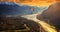 distant view of a man paragliding near the mountains