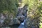 Distant view of the multi-step Iadolina waterfall, Romania