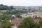 Distant view over Bath to railway station and train