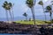 Distant view at a statue of Buddha at a shore of Pacific ocean, Hawaii, Big island.