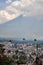 Distant view of the Volcano El Fuego o Acatenango with cross in