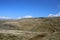 Distant walker on rough moorland footpath, Cumbria