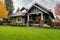 distinct craftsman house with overhanging eaves, green lawn