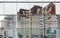 Distorted reflection of multi-storied residential buildings in m