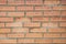 Distress old brick wall textures. Brick orange color background. Background brick textures.