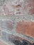 Distressed aged brick wall background