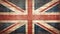 Distressed dark worn background of a vintage Union Jack national flag of the United Kingdom on wooden board panels