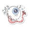 distressed sticker of a cartoon eyeball crying