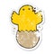 distressed sticker of a cartoon hatching bird