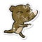 distressed sticker of a cartoon running bear